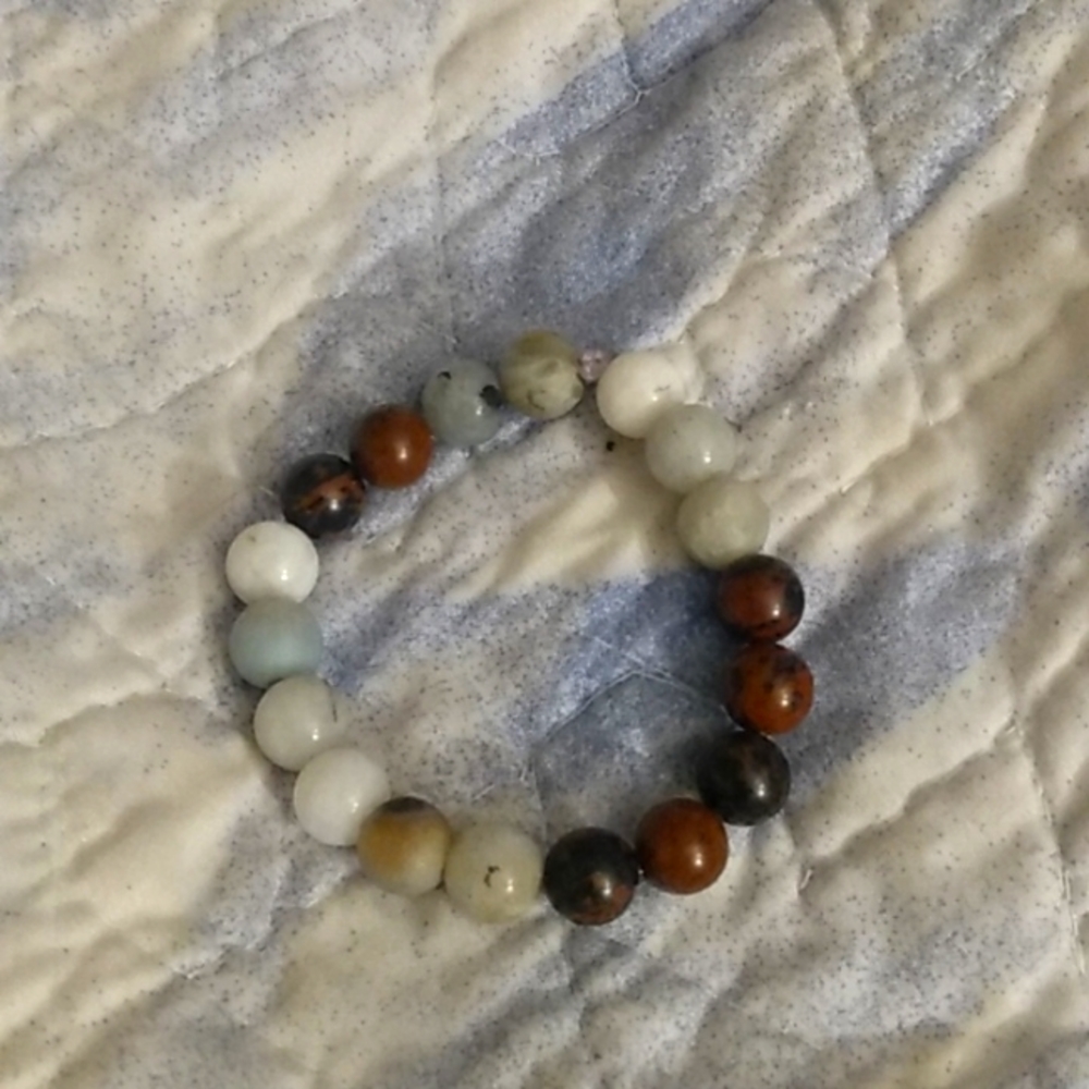 7 Chakra bracelet with mica in each 10mm bead.